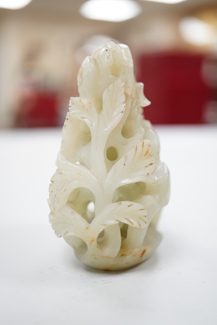 A Chinese pale celadon jade 'deer' pebble carving, 7cm high
